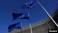 Belgium - European Union flags flutter outside the European Commission headquarters in Brussels, February 26, 2026. 