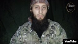A screengrab of Caucasus Islamist insurgent Mukhammad Abu Dudjana Gimrinsky who recently made a video appeal calling on "sincere believers" to join the jihad against "unbelievers." 