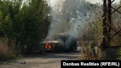 Горить автівка, в яку влучив російський FPV дрон. Біля Дружківки. 13 вересня 2026 року