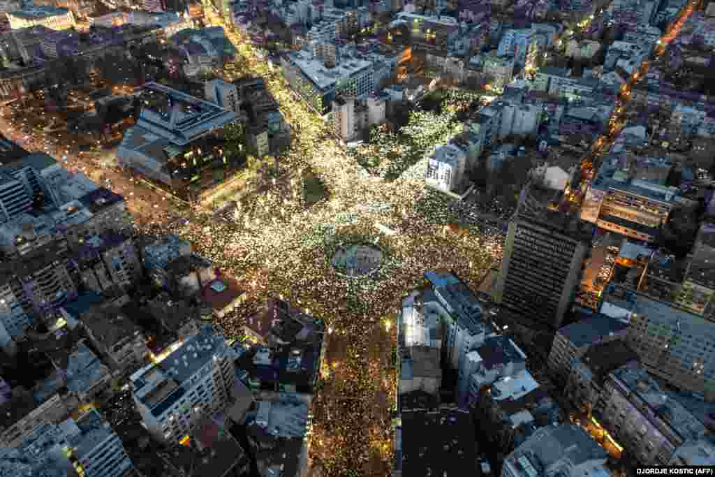 An aerial view shows thousands of students and citizens attending a protest in Belgrade over the collapse of a train station roof that killed 15 people in the city of Novi Sad last month.&nbsp;