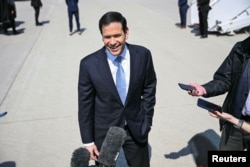 US Secretary of State Marco Rubio talks to reporters on March 26.
