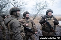 Trainee soldiers who were recently released from prison during training in eastern Ukraine.