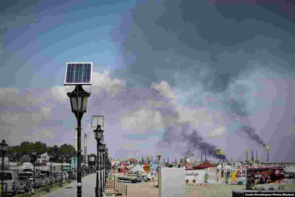 Smoke rises after an explosion at the Petromidia oil refinery in Navodari, Romania, on July 2.&nbsp;