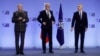 Russian Deputy Defense Minister Aleksandr Fomin (left), Russian Deputy Foreign Minister Aleksandr Grushko (center), and NATO Secretary-General Jens Stoltenberg during a NATO-Russia Council meeting in Brussels on January 12.