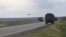 Украинский БПЛА-крыло атакует российский военный транспорт возле Мангуша (трасса Таганрог-Джанкой в тылу оккупированной территории)