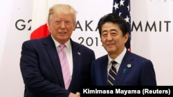 U.S. President Donald Trump (left) and Japanese Prime Minister Shinzo Abe (file photo)