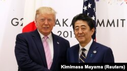 Раиси ҷумҳурии Амрико Доналд Трамп бо сарвазири Ҷопон Шинзо Абе. Моҳи июни соли 2019