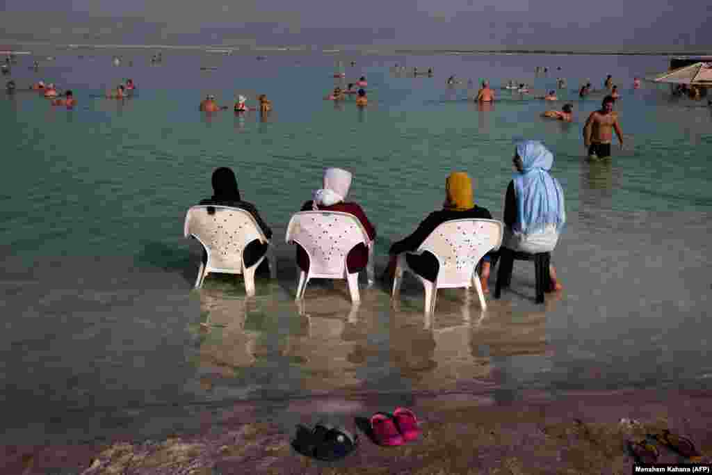 Tourists hang out at the resort of Neve Zohar on the Dead Sea in southern Israel. (AFP/Menahem Kahana)