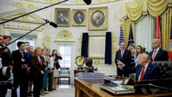 US President Donald Trump speaks to reporters at the White House on September 18.