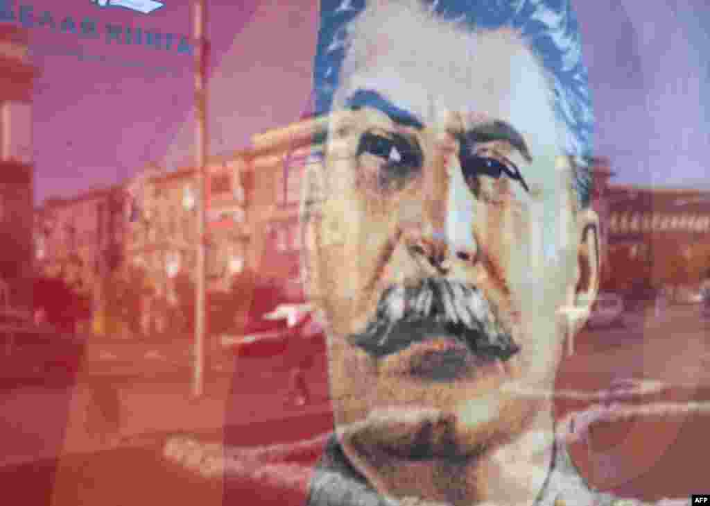 A portrait of Soviet dictator Josef Stalin is seen on an advertising billboard in rebel-held Donetsk, eastern Ukraine. (AFP/Aleksei Filippov)