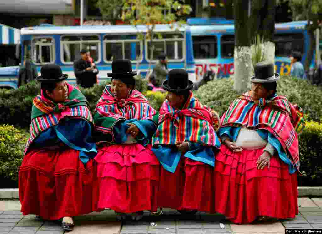 Women who support the Qhara Qhara community, a Quechua ethnic group, rest during a protest in La Paz, Bolivia. (Reuters/David Mercado)