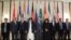  Russian Foreign Minister Sergei Lavrov (center) and members of Taliban delegation pose before the multilateral peace talks on Afghanistan in Moscow