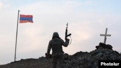 Armenia - An Armenian soldier stands guard on the border with Azerbaijan, November 12, 2021