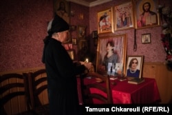 Every day, Manana Kobakhidze lights a candle in her daughter-in-law's former bedroom.