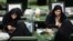 Iranian female members of parliament including Parvaneh Salahshouri (top right) in a session of parliament, undated.