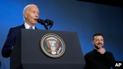 Američki predsjednik Joe Biden i njegov ukrajinski kolega Volodimir Zelenski u Washingtonu 11. jula 2024.