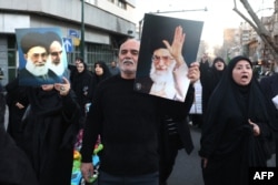 Iranians shouting slogans march as they mourn the day after the assassination of Iran’s supreme leader, Ayatollah Ali Khamenei, who was killed in joint US and Israeli strikes in Tehran on March 1.