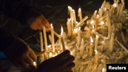 Ashura mourners light candles in Tehran (file photo)