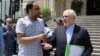 Journalist Amir Tohid Fazel (left) with Iranian Foreign Minister Mohammad Javad Zarif probably in Tehran. (file photo)