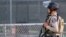 A police officer stands watch at the scene of a mass shooting during the Gilroy Garlic Festival in Gilroy, California, U.S. July 28, 2019.  REUTERS/Chris Smead. NO ARCHIVES. NO RESALES.