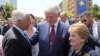 KOSOVO -- Former U.S. President Bill Clinton, center, speaks with ex-Secretary of State Madeleine Albright, right, and then-NATO commander Wesley Clark during anniversary celebrations in the capital Pristina, June 12, 2019