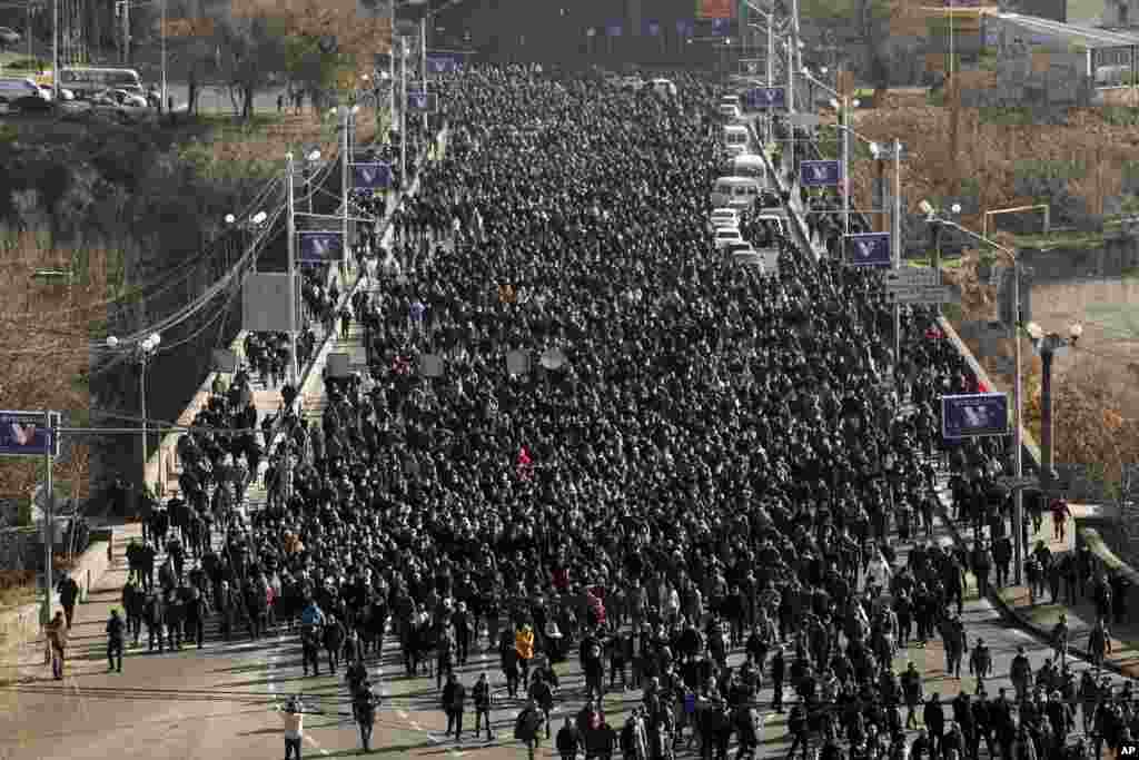 A march through central Yerevan on December 19 as mourning officially began