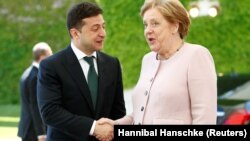 Angela Merkel la primirea președintelui Volodimir Zelensky at the Chancellery in Berlin, June 18, 2019