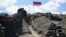 Armenian soldiers at a border checkpoint between Armenia and Azerbaijan near the village of Sotk. (file photo)