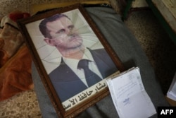 Un portret al președintelui Bashar al-Assad.