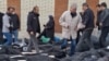 A video grab taken on January 14 from UGC images posted on social media shows dozens of bodies lying on the ground at the Tehran Province Forensic Diagnostic and Laboratory Center.