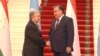 UN chief Antonio Guterres (left) meets Tajik President Emomali Rahmon in Dushanbe on June 12.