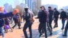 Masked Men Attack Women's Day Rally In Kyrgyz Capital; Police Detain Demonstrators