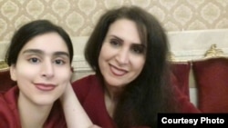 Zahra Shahbaz Tabari (right) is pictured with her daughter in this undated photo.