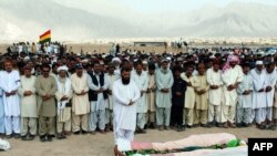 Fellow party members and relatives offer funeral prayers for Habib Jalib in Quetta on July 14