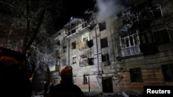 Украина - Зграда погодена од руски напад со беспилотни летала, Харков, 24 јануари 2026 година. 