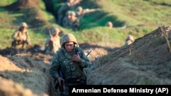 ARMENIA -- Armenian soldiers take their position on the on the border with Azerbaijan in Tavush region, July 14, 2020