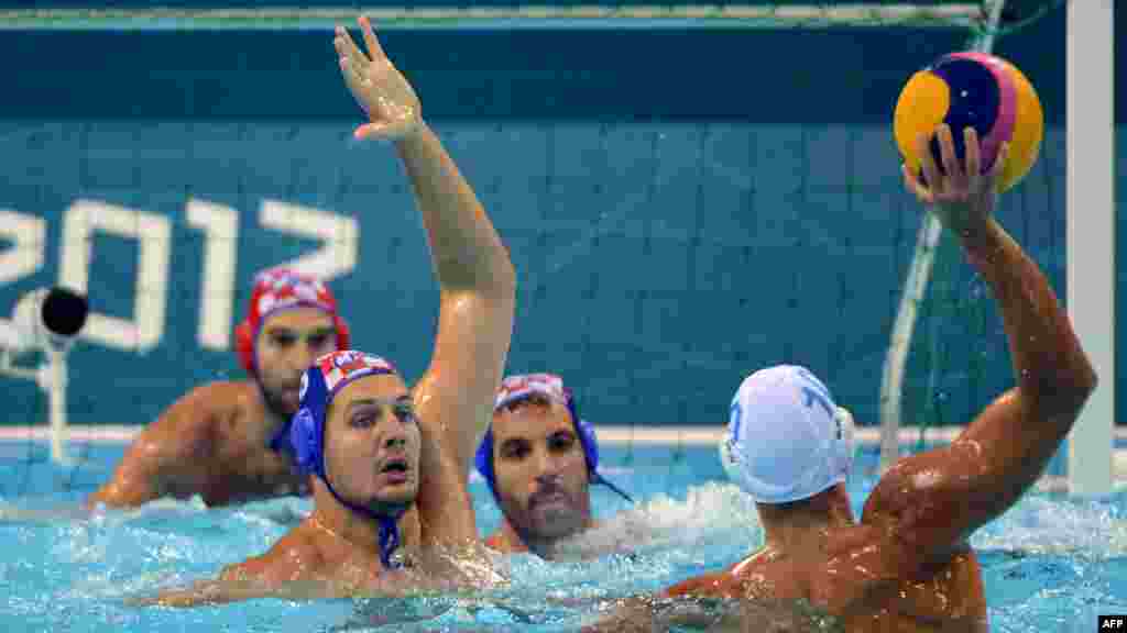 Velika Britanija - Hrvatski vaterpolo tim u borbi za olimpijske medalje, 2. august 2012. Foto: AFP / Khaled Desouki