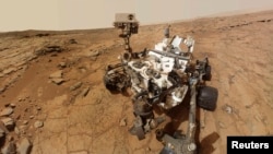 Space -- NASA's Mars rover Curiosity is pictured in a handout self-portrait, 03Feb2013