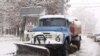 Armenia -- Municipal vehicle cleans the street in Yerevan after a heavy snowfall, Yerevan, 01Feb2011