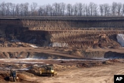 A view of an ilmenite open pit mine in a canyon in the central region of Kirovohrad, Ukraine.