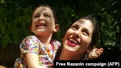 Nazanin Zaghari-Ratcliffe embraces her daughter Gabriella , following her release from prison for three days, August 23, 2018