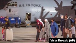 Families evacuated from Kabul arrive in the Kosovar capital, Pristina, on August 29.