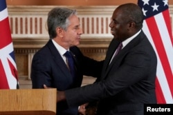 U.S. Secretary of State Blinken greets British Foreign Secretary David Lammy in London on September 10.