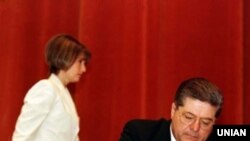 Павло Лазаренко ўз партиядоши Юлия Тимошенко билан. 1997 йил.