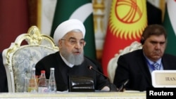 Iranian President Hassan Rouhani delivers a speech at the Conference on Interaction and Confidence-Building Measures in Asia (CICA) in Dushanbe, Tajikistan June 15, 2019. REUTERS/Mukhtar Kholdorbekov