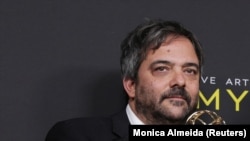 Адам Шлезингер