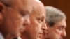 John Negroponte (center, in file photo)