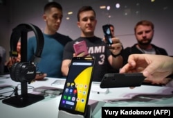 Russian Internet giant Yandex unveils a smart phone in Moscow in December 2018.
