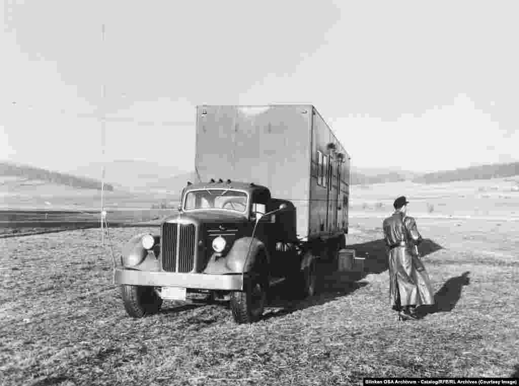 An armed guard patrols a medium-wave radio transmitter truck in West Germany, near the border with Czechoslovakia, in 1955.As communist states moved to jam RFE and Radio Liberty’s broadcasts, Radio Free Europe deployed dozens of mobile transmitter stations, such as the one seen above, which could operate close to the Iron Curtain.