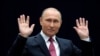 Russian President Vladimir Putin gestures as he speaks to journalists following a live nationwide broadcast call-in on June 15. 